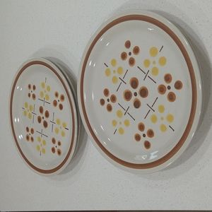 Vintage dinner plates speckled atomic pattern